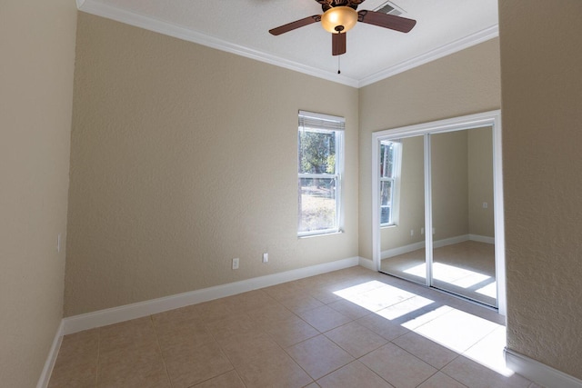 2007 Bayshore Dr, Niceville, FL 32578 - tiled empty room featuring ornamental molding, ceiling fan, and a textured wall