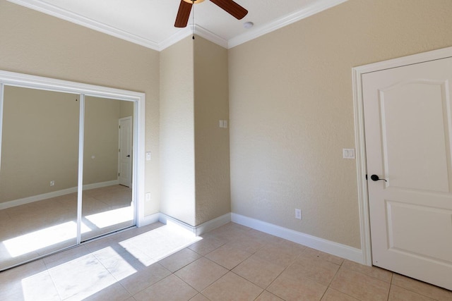 2007 Bayshore Dr, Niceville, FL 32578 - empty room featuring crown molding, ceiling fan, and light tile patterned floors