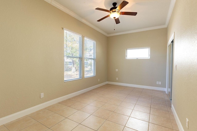 2007 Bayshore Dr, Niceville, FL 32578 - spare room featuring ornamental molding, a ceiling fan, and light tile patterned floors