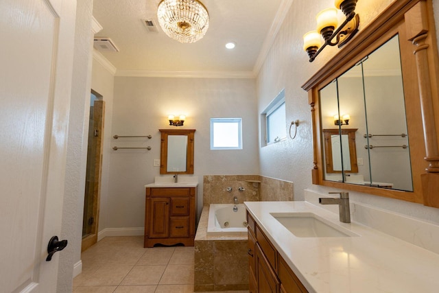 2007 Bayshore Dr, Niceville, FL 32578 - bathroom with a chandelier, a jetted tub, crown molding, tile patterned flooring, and two vanities