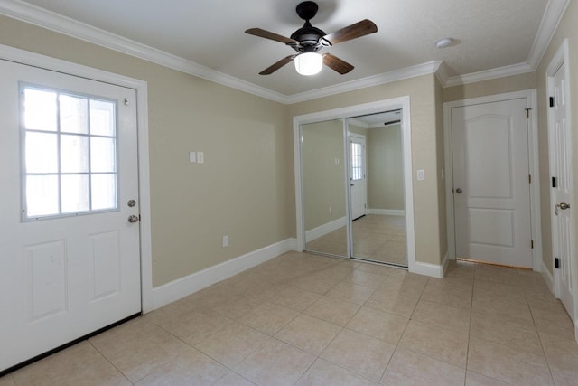 2007 Bayshore Dr, Niceville, FL 32578 - entryway featuring ceiling fan, crown molding, and light tile patterned flooring