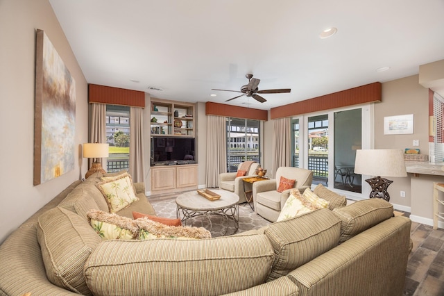 9815 US Highway 98 Unit 34, Miramar Beach, FL 32550 - living room featuring a ceiling fan, wood finished floors, baseboards, and recessed lighting