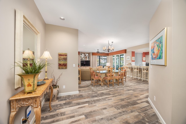 9815 US Highway 98 Unit 34, Miramar Beach, FL 32550 - dining room featuring a chandelier, wood finished floors, baseboards, and recessed lighting