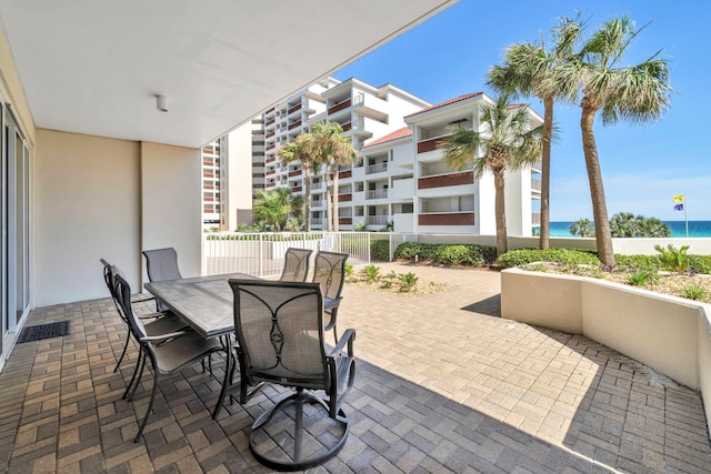 550 Tops L Beach Blvd # 102, Miramar Beach, FL 32550 - view of patio featuring a water view and outdoor dining area