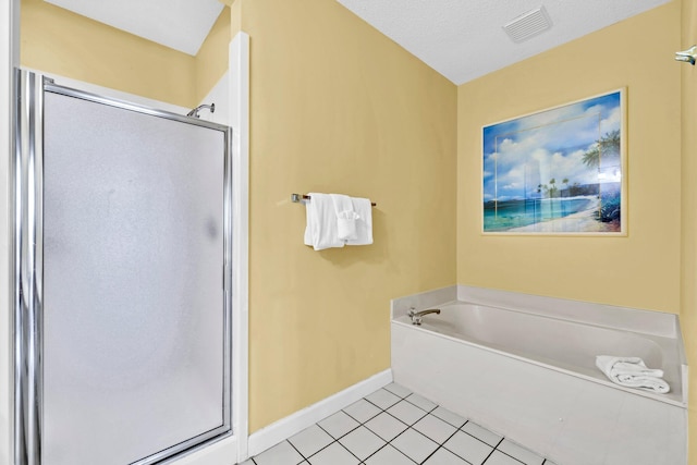 550 Tops L Beach Blvd # 102, Miramar Beach, FL 32550 - bathroom with a shower stall, baseboards, tile patterned floors, and a bath