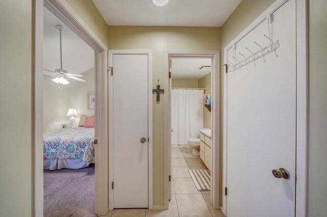 17614 Front Bch Unit E17, Panama City Beach, FL 32413 - hall with light tile patterned floors