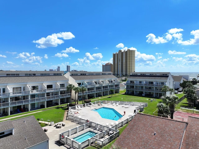 17614 Front Bch Unit E17, Panama City Beach, FL 32413 - community pool featuring a lawn
