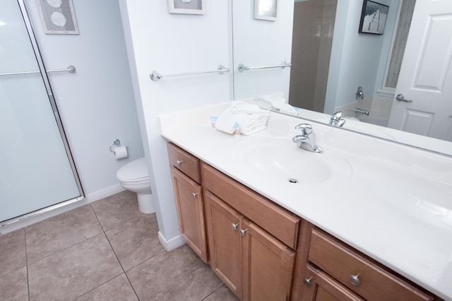 1517 Miracle Strip Pkwy Unit 403, Fort Walton Beach, FL 32548 - full bathroom with toilet, vanity, a shower, and tile patterned floors