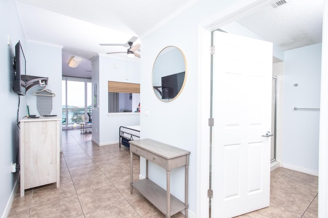 1517 Miracle Strip Pkwy Unit 403, Fort Walton Beach, FL 32548 - corridor with light tile patterned flooring, ornamental molding, and baseboards