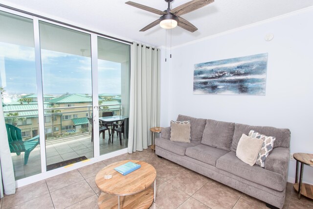 1517 Miracle Strip Pkwy Unit 403, Fort Walton Beach, FL 32548 - living area with expansive windows, a ceiling fan, crown molding, and tile patterned floors