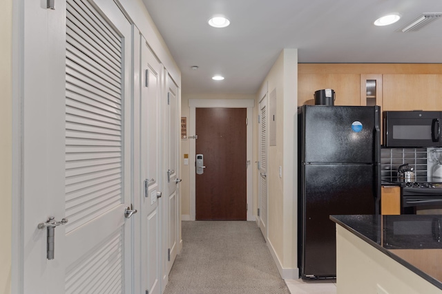 9700 Grand Sandestin Blvd Unit 4313, Miramar Beach, FL 32550 - kitchen featuring black appliances, recessed lighting, baseboards, light carpet, and decorative backsplash