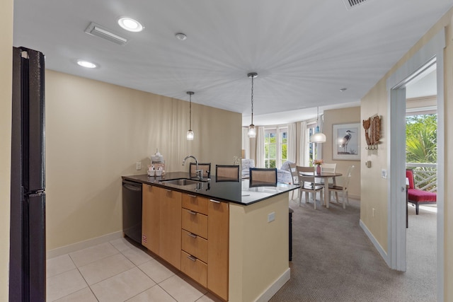 9700 Grand Sandestin Blvd Unit 4313, Miramar Beach, FL 32550 - kitchen with a sink, black appliances, dark countertops, baseboards, and decorative light fixtures