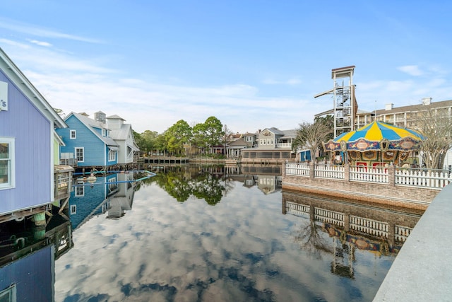 9700 Grand Sandestin Blvd Unit 4313, Miramar Beach, FL 32550 - dock featuring a water view, a residential view, and a gazebo