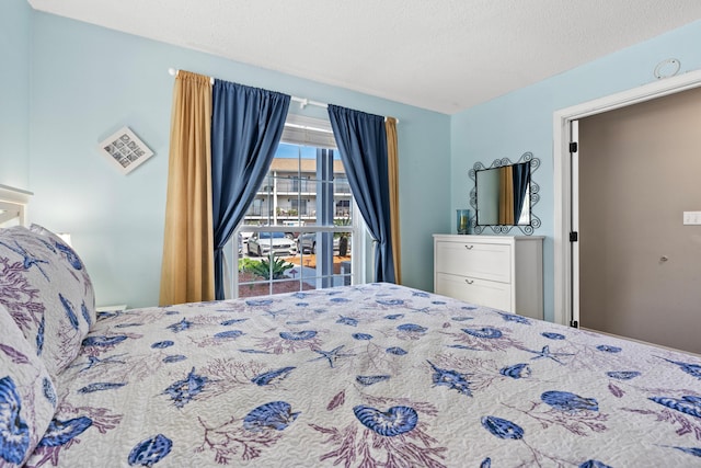 2384 Scenic Gulf Dr Unit 112, Miramar Beach, FL 32550 - bedroom featuring a textured ceiling