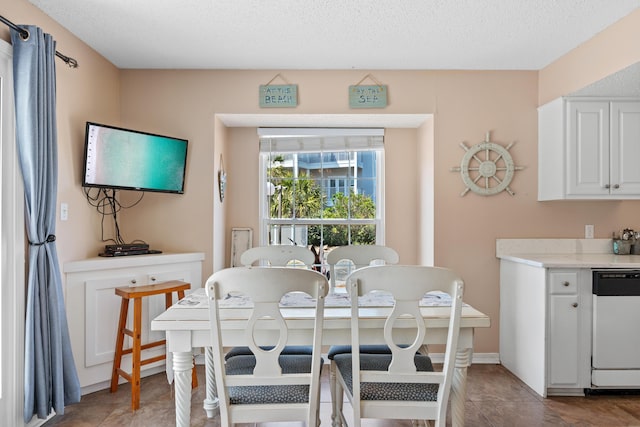 2384 Scenic Gulf Dr Unit 112, Miramar Beach, FL 32550 - dining room featuring light tile patterned floors and baseboards