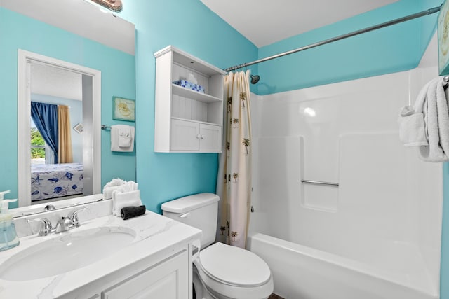 2384 Scenic Gulf Dr Unit 112, Miramar Beach, FL 32550 - full bathroom featuring shower / bathtub combination with curtain, vanity, toilet, and ensuite bathroom