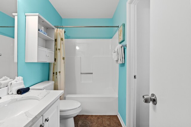 2384 Scenic Gulf Dr Unit 112, Miramar Beach, FL 32550 - bathroom featuring toilet, vanity, shower / bath combination with curtain, and tile patterned flooring