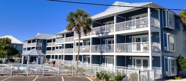 2384 Scenic Gulf Dr Unit 112, Miramar Beach, FL 32550 - view of building exterior with uncovered parking