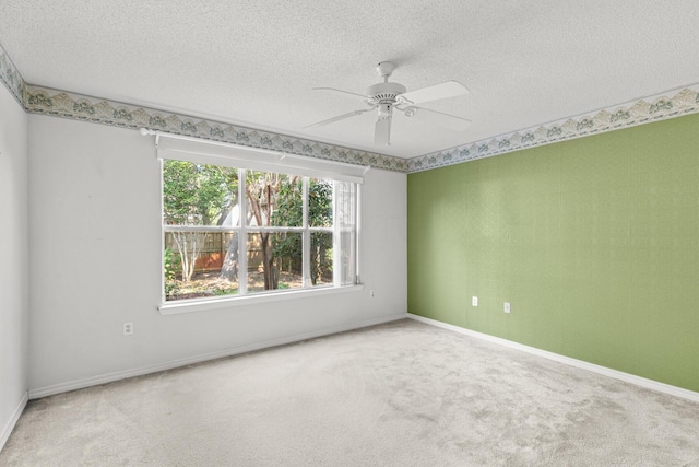 7 Citation Dr, Shalimar, FL 32579 - empty room featuring a ceiling fan, carpet, and a textured ceiling