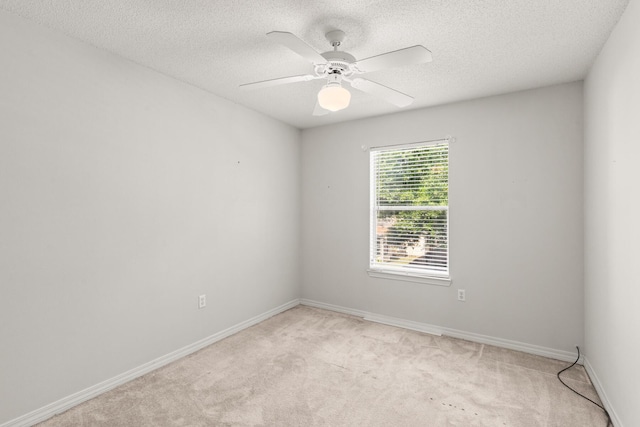 7 Citation Dr, Shalimar, FL 32579 - spare room with light carpet, a ceiling fan, and a textured ceiling