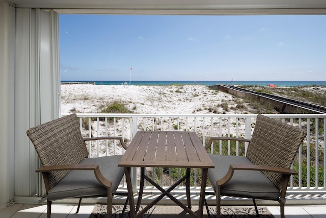 376 Santa Rosa Blvd Unit 101, Fort Walton Beach, FL 32548 - balcony featuring view of water and beach and outdoor dining area