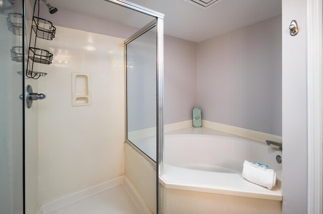 376 Santa Rosa Blvd Unit 101, Fort Walton Beach, FL 32548 - bathroom featuring a stall shower and a bath