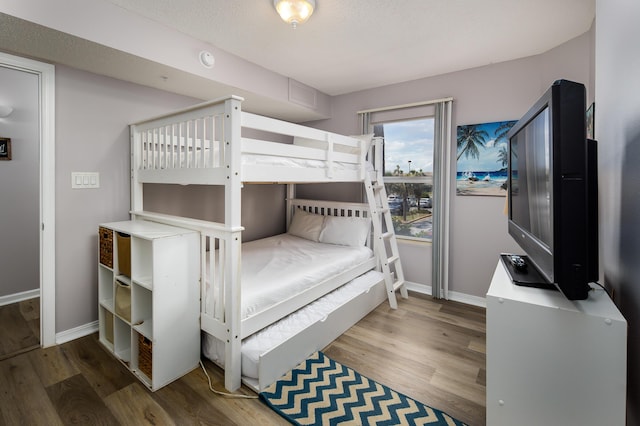 376 Santa Rosa Blvd Unit 101, Fort Walton Beach, FL 32548 - bedroom with wood finished floors and baseboards