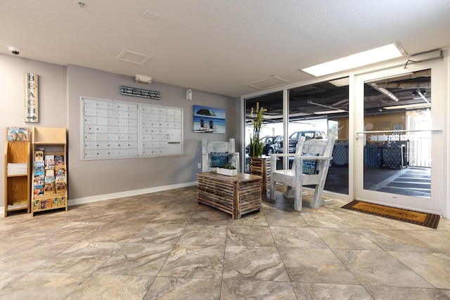 376 Santa Rosa Blvd Unit 101, Fort Walton Beach, FL 32548 - view of property's community featuring mail area and a textured ceiling