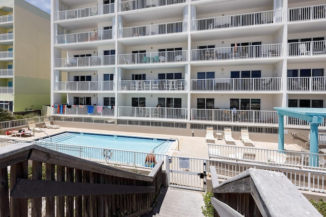 376 Santa Rosa Blvd Unit 101, Fort Walton Beach, FL 32548 - community pool featuring a patio area