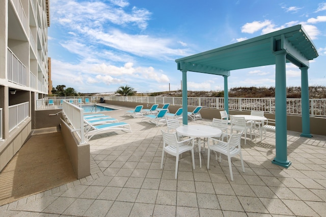 376 Santa Rosa Blvd Unit 101, Fort Walton Beach, FL 32548 - view of patio with a community pool