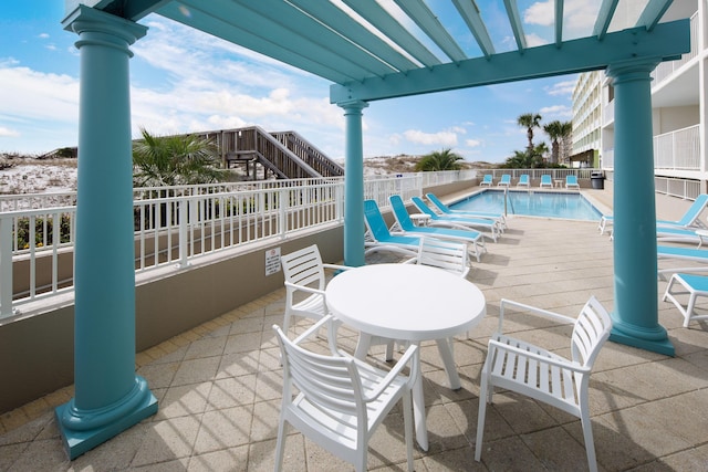 376 Santa Rosa Blvd Unit 101, Fort Walton Beach, FL 32548 - view of patio with a community pool