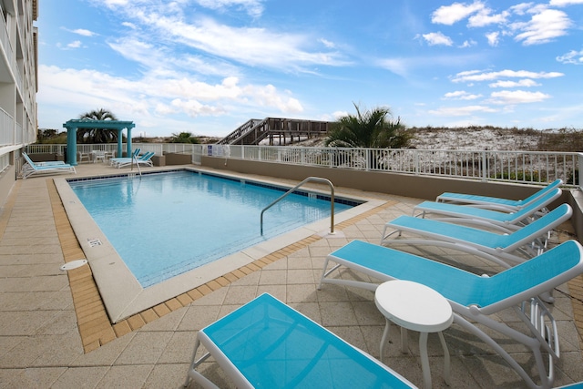 376 Santa Rosa Blvd Unit 101, Fort Walton Beach, FL 32548 - community pool featuring a patio area and a pergola