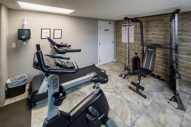 376 Santa Rosa Blvd Unit 101, Fort Walton Beach, FL 32548 - workout room with wooden walls