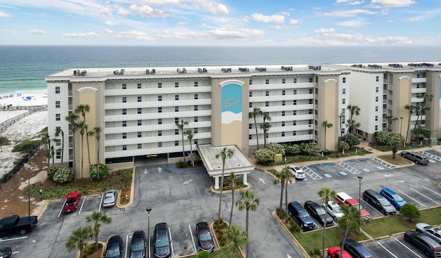 376 Santa Rosa Blvd Unit 101, Fort Walton Beach, FL 32548 - view of apartment building / complex featuring a water view and uncovered parking
