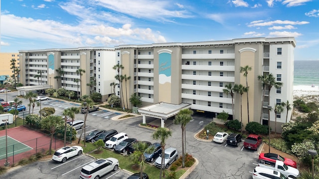 376 Santa Rosa Blvd Unit 101, Fort Walton Beach, FL 32548 - view of apartment building / complex featuring uncovered parking and a water view