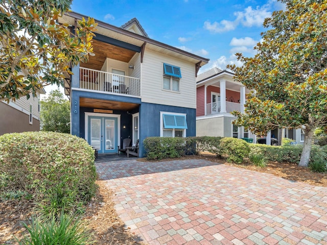 216 Tahitian Way, Destin, FL 32541 - view of front of home with a balcony and stucco siding