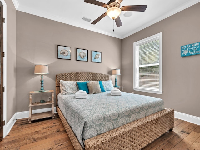 216 Tahitian Way, Destin, FL 32541 - bedroom featuring wood-type flooring, baseboards, crown molding, and ceiling fan