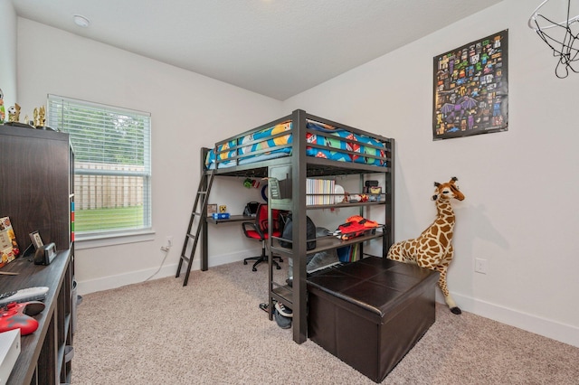 125 Hobson Ave, Crestview, FL 32539 - carpeted bedroom featuring baseboards