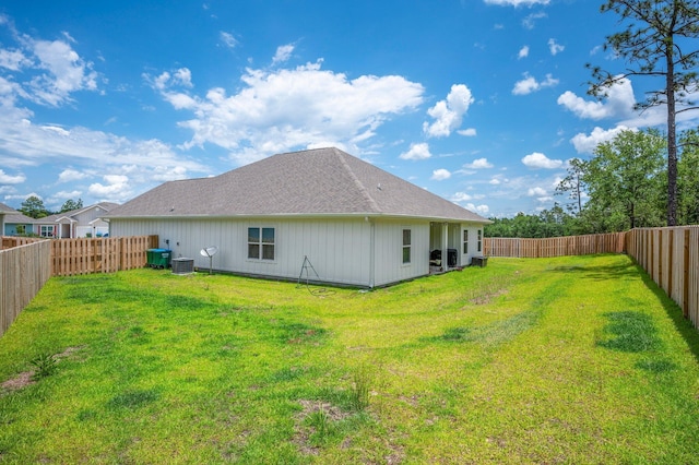 125 Hobson Ave, Crestview, FL 32539 - back of house featuring roof with shingles and central air condition unit
