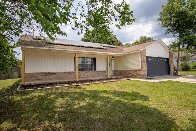 175 Villacrest Dr, Crestview, FL 32536 - single story home featuring brick siding, a garage, concrete driveway, and solar panels