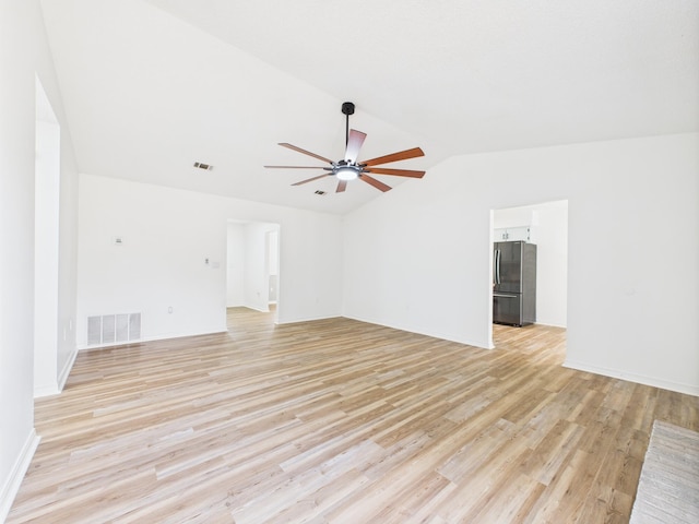 175 Villacrest Dr, Crestview, FL 32536 - unfurnished living room with ceiling fan, lofted ceiling, light wood-style flooring, and baseboards