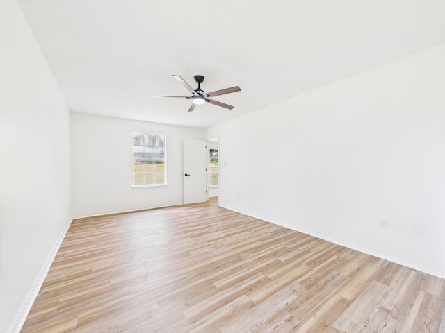 175 Villacrest Dr, Crestview, FL 32536 - unfurnished room featuring light wood-style floors, a ceiling fan, and baseboards