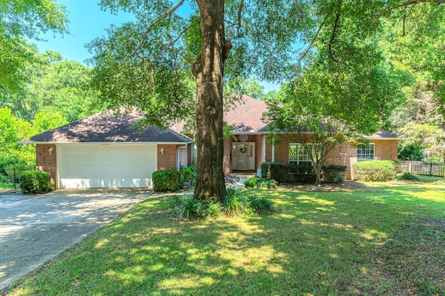 4680 Lovegrass Ln, Crestview, FL 32539 - view of front facade featuring brick siding, a garage, and concrete driveway