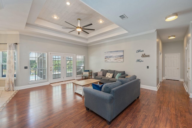 4680 Lovegrass Ln, Crestview, FL 32539 - living area with a tray ceiling, ceiling fan, dark wood-style floors, recessed lighting, and ornamental molding