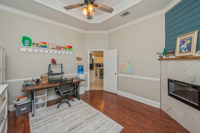 4680 Lovegrass Ln, Crestview, FL 32539 - office featuring ceiling fan, ornamental molding, wood finished floors, and a fireplace