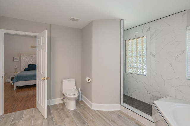 4680 Lovegrass Ln, Crestview, FL 32539 - ensuite bathroom featuring a garden tub, wood finish floors, and a walk in shower