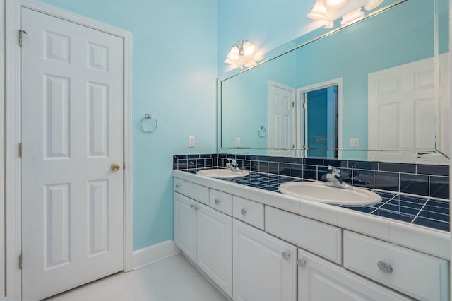 4680 Lovegrass Ln, Crestview, FL 32539 - full bath with double vanity and tile patterned flooring