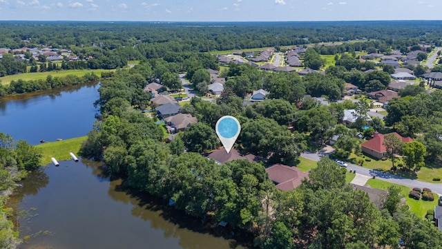 4680 Lovegrass Ln, Crestview, FL 32539 - aerial view of residential area with a nearby body of water and a heavily wooded area