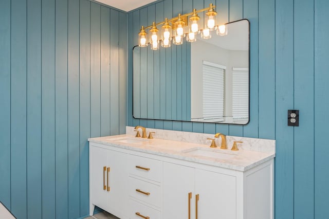 4680 Lovegrass Ln, Crestview, FL 32539 - full bathroom featuring double vanity and wooden walls