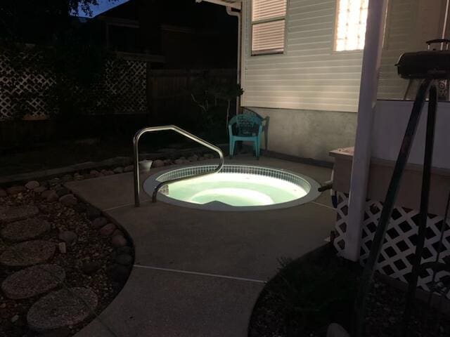 4680 Lovegrass Ln, Crestview, FL 32539 - view of patio featuring a community hot tub